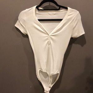 White V-neck w/button detail bodysuit